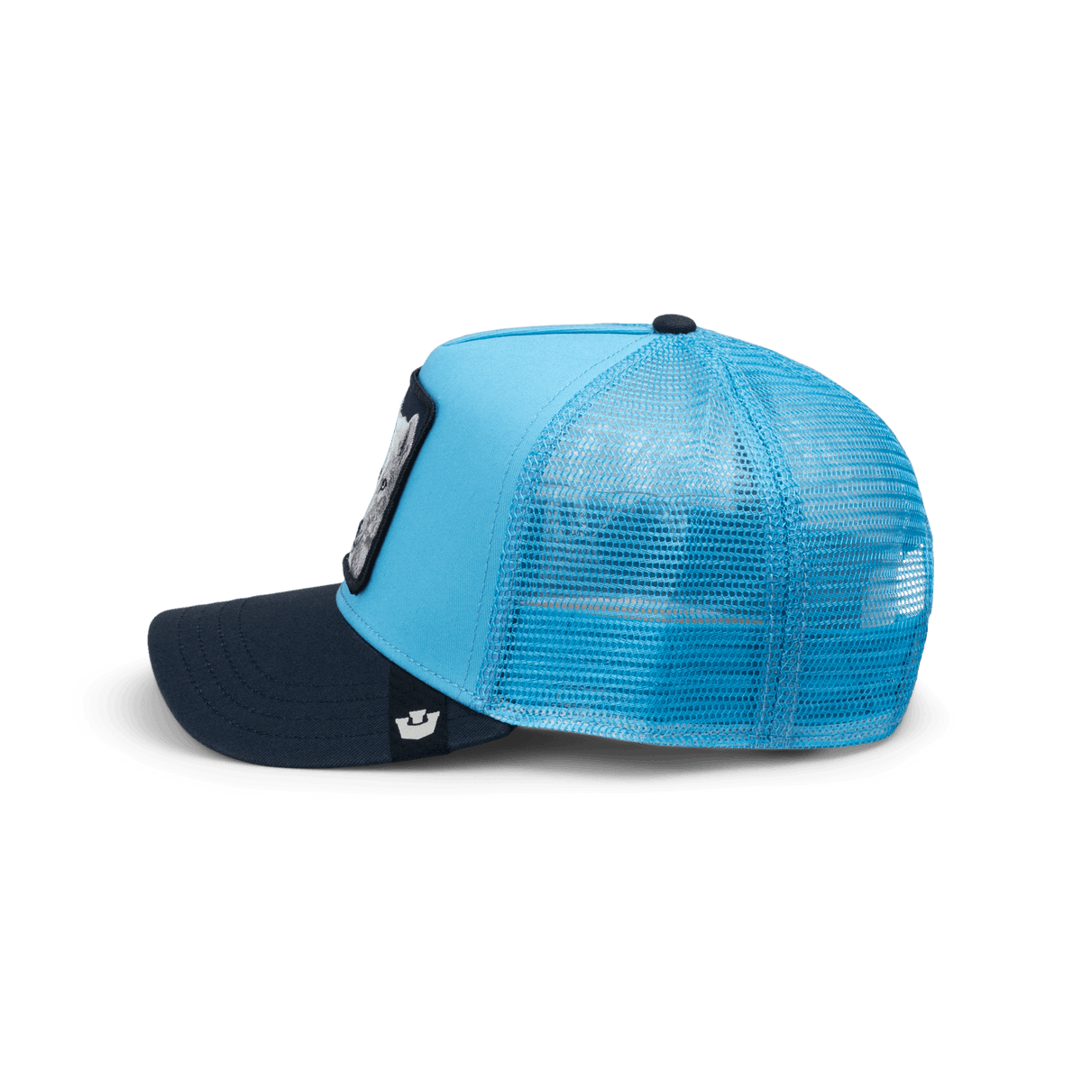 The Goorin Bros. Legend Wolf Trucker Mini is a color-blocked trucker cap with a light blue mesh back, cyan front panels, and navy bill, featuring a small logo patch on the side, shown in a studio product shot against a black background.