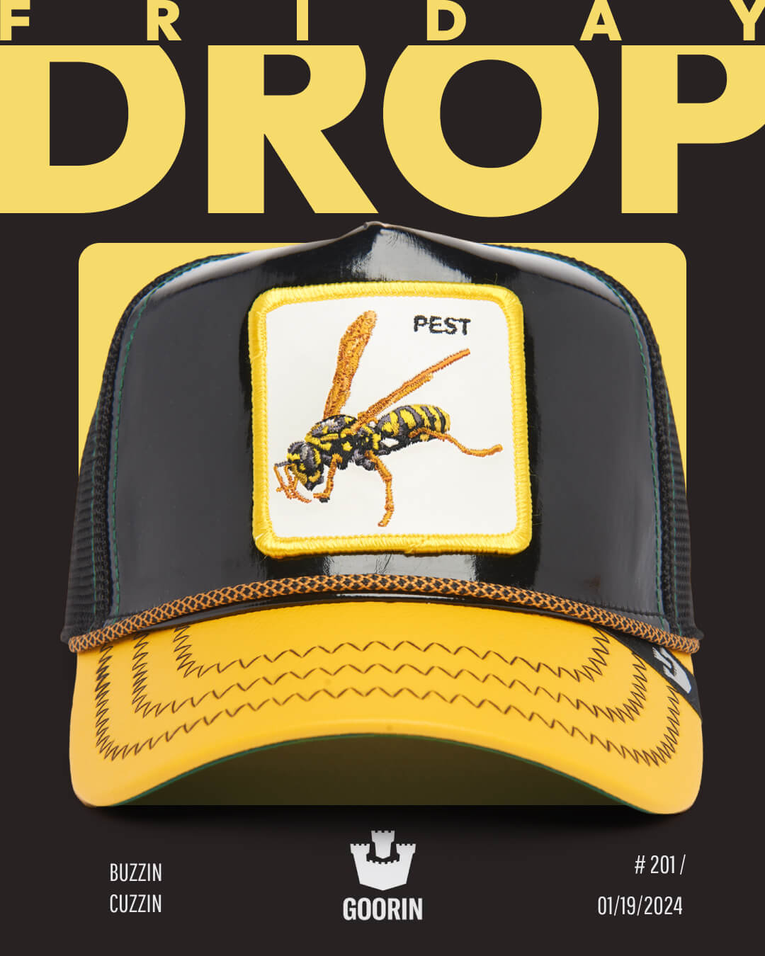 A yellow and black trucker hat with a patch showing a wasp labeled “PEST” is displayed against a black and yellow background with “FRIDAY DROP” in large text—perfect for fans of American made, durable hats.