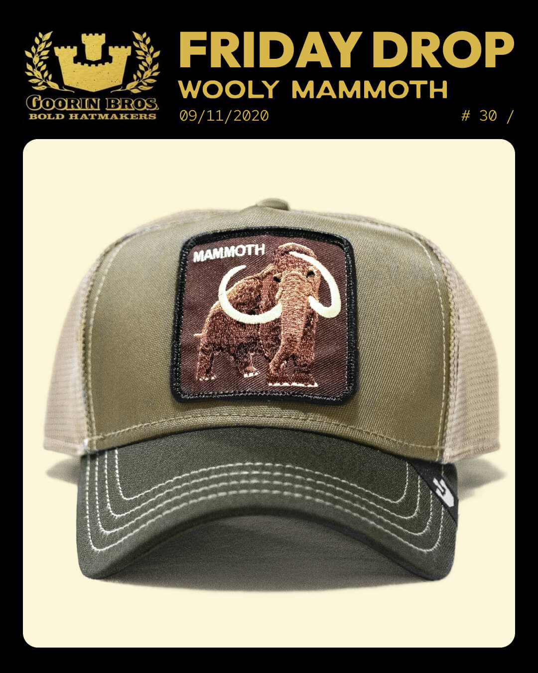 A green and beige trucker hat with a patch featuring a woolly mammoth and the word “MAMMOTH.” This Durable hat is displayed under promotional text for a “Friday Drop” by Goorin Bros.