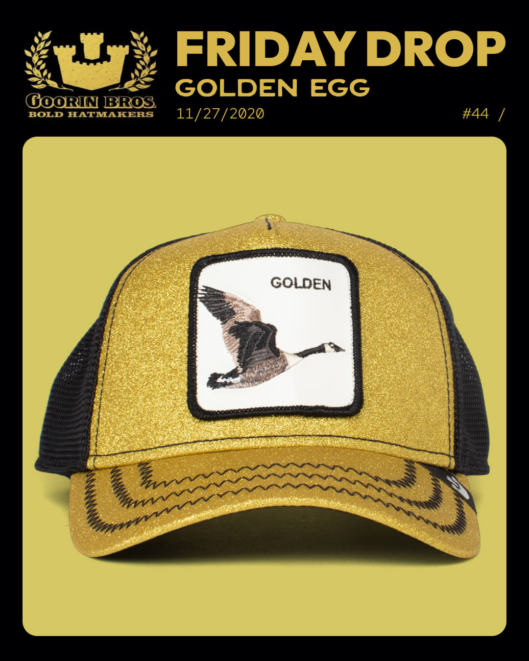 A gold glitter Goorin trucker hat with a patch featuring a flying goose and the word GOLDEN, displayed against a yellow background. Text above reads FRIDAY DROP GOLDEN EGG—perfect for fans of bold hat designs.