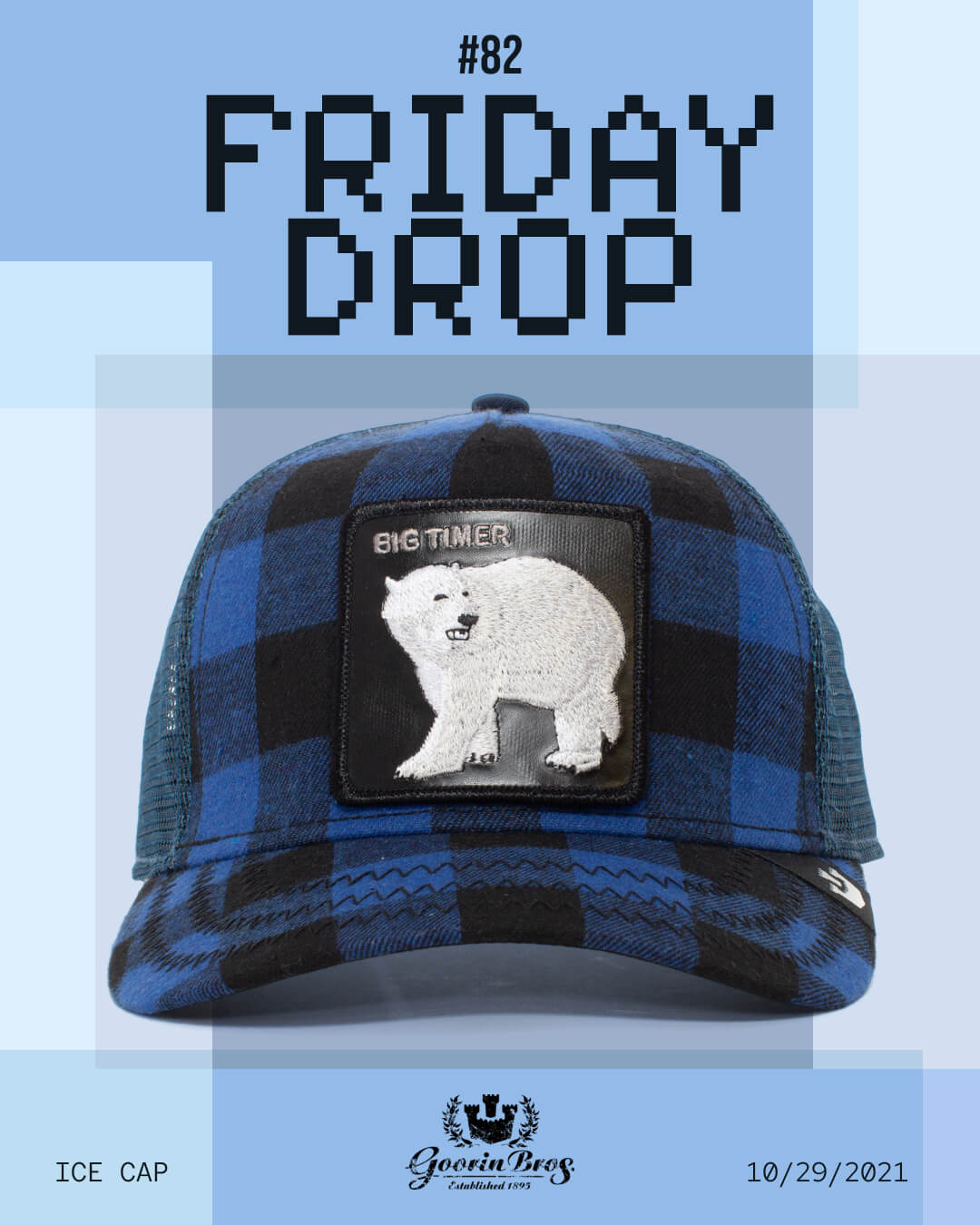 A blue and black plaid trucker hat from Goorin, featuring a polar bear patch labeled BIG TIMER, is displayed against a geometric blue background with the text FRIDAY DROP #82. Perfect for fans of bold hat designs.