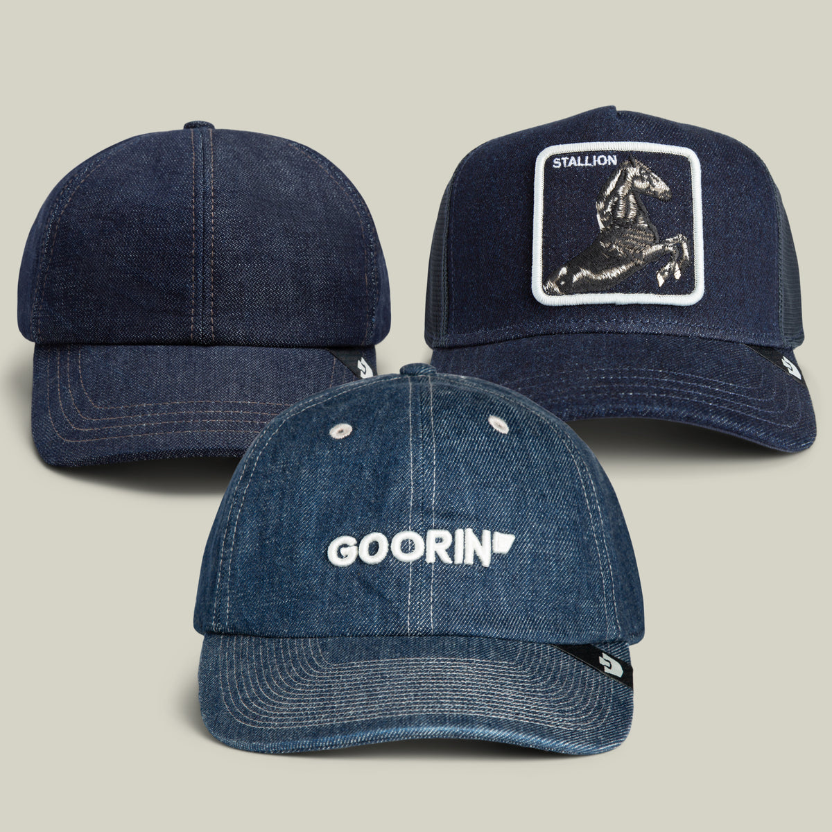 Three blue denim baseball caps from the Goorin Bros. Jorts Bundle are displayed: one featuring GOORIN text, another showcasing a horse patch labeled “STALLION” for a vintage Mom Jeans vibe, and one in a classic, plain design.