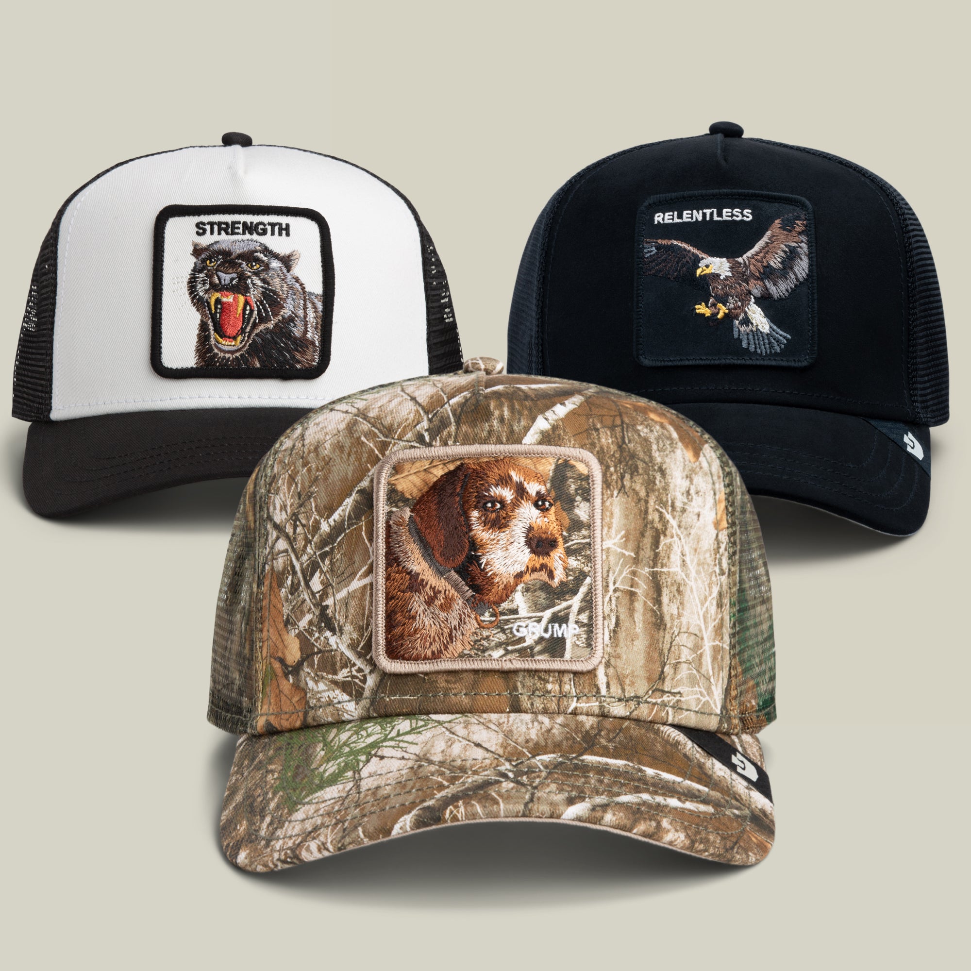 Featuring three Goorin Bros. trucker hats—one with a bear and “STRENGTH” text, one with an eagle and “RELENTLESS” text, and one with a dog against a camouflage background—the Last Place Bundle helps you own the L and celebrate every glorious defeat in style.