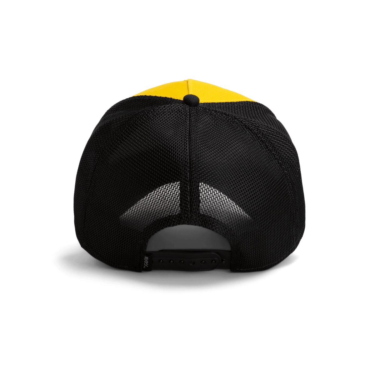 The Heartbreaker by Goorin Bros is a two-tone trucker hat featuring a yellow front panel and black mesh back with snapback closure, shown in a studio product shot.