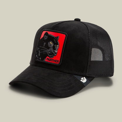 The Goorin Bros. Pantera Nera Rossa black trucker hat features a mesh back and embroidered red patch with a black panther design and text on the front, displayed against a neutral background.